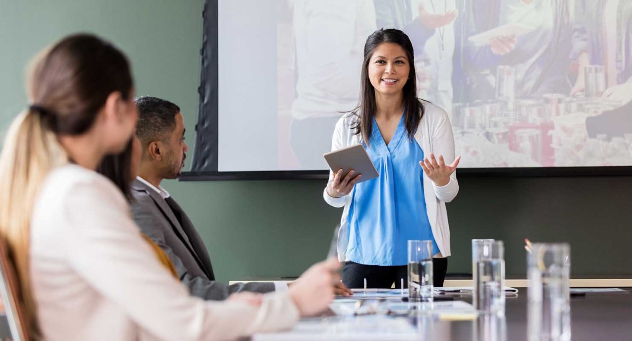 Woman presenting and charity meeting