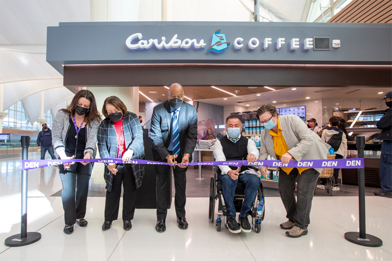 Rod Tafoya (second from right) at the ribbon cutting for one of Mission Yogurt’s newest locations.